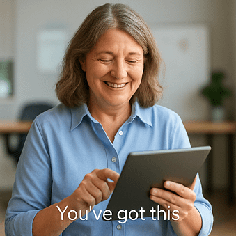 Restoring Confidence in a Changing Digital World Middle-aged team member smiling after completing digital training on a tablet.